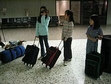 the girls and their matching carryons