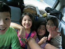 driving in the van with four kids