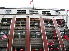 nationalist flags flying over the chinatown community center